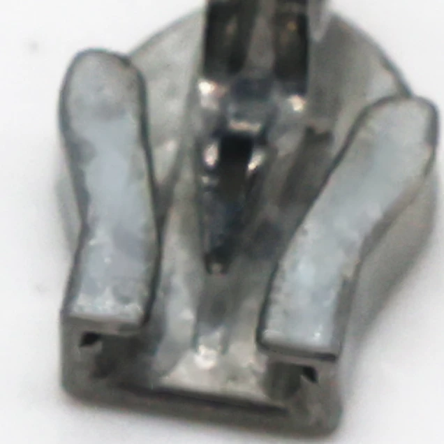 Gray surface/no luster