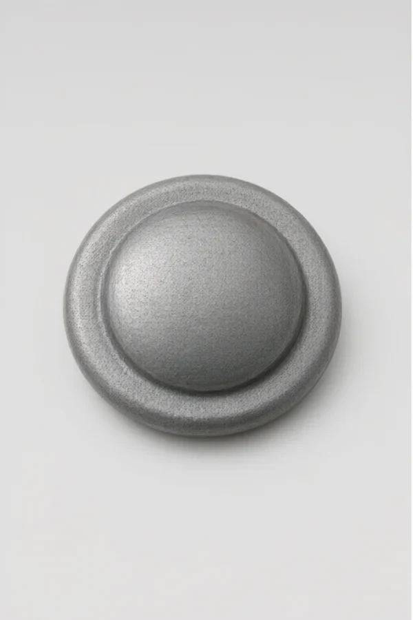 Raw die-cast Zinc Alloy Snap Button before dewaxing and surface finishing - dull gray unplated surface