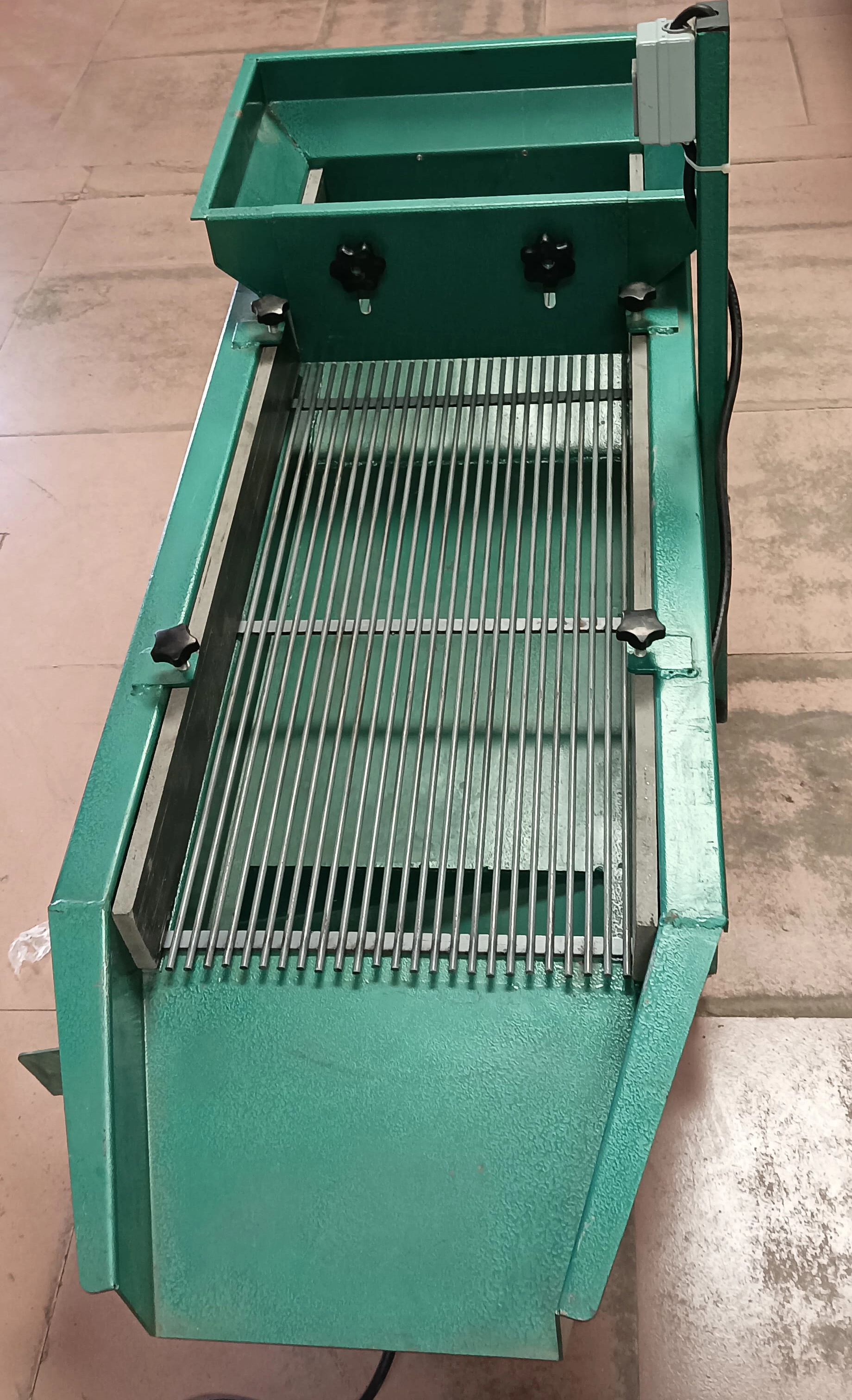 Metal polishing machine and buffing wheel in workshop - production view