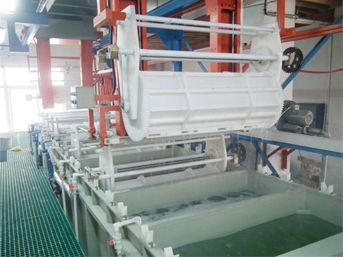 Plating production line with tanks and conveyor