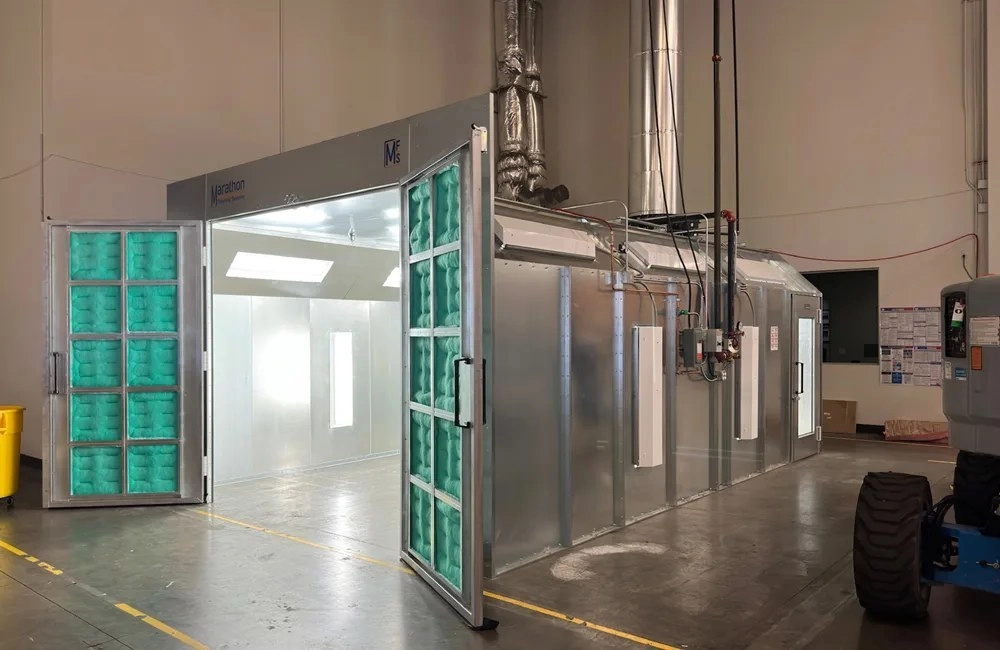 Powder coating machine and curing oven - production view