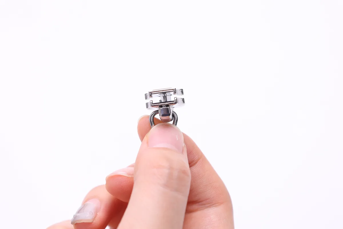 Zipper slider close-up - rack plating reference case