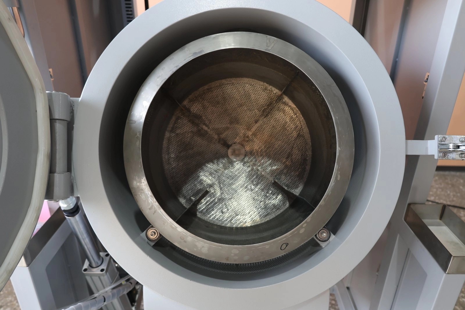 Inside a QLQ process barrel - parts see uniform coverage in every batc
